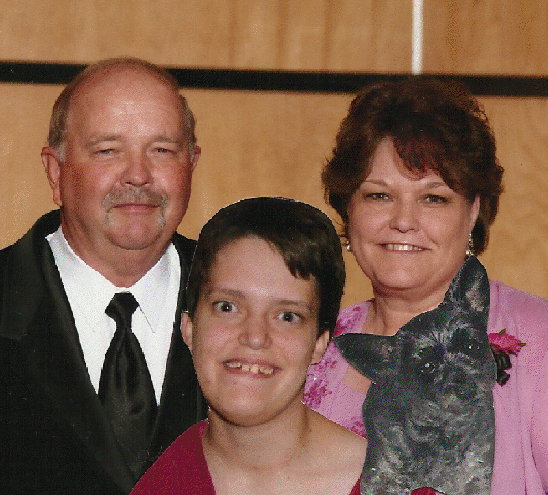 Joyce Keim Peterson with her husband Maury and her daughter Kendra -- and Penny!